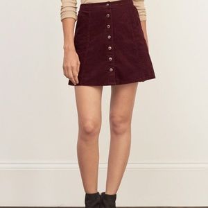 burgundy corduroy skirt outfit